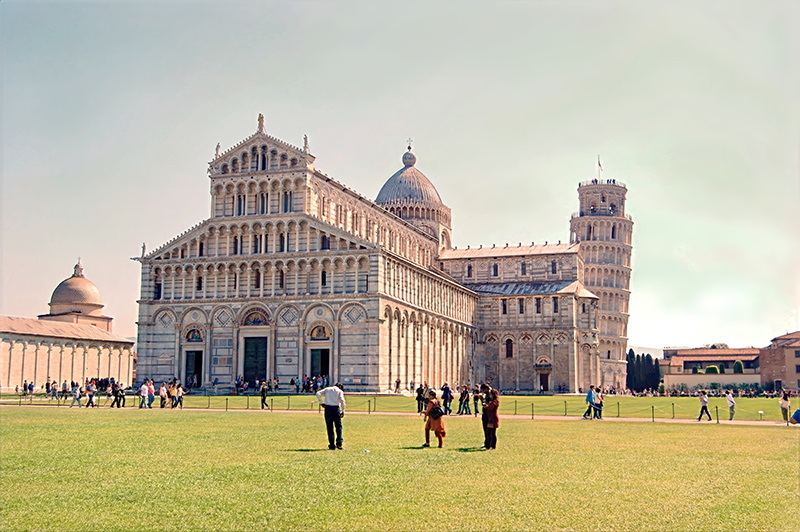 6 - Piazza dei Miracoli in Pisa, Italy, a UNESCO World Heritage Site featuring the medieval Pisa Cathedral (Duomo di Santa Maria Assunta) and its famous Leaning Tower in the background
